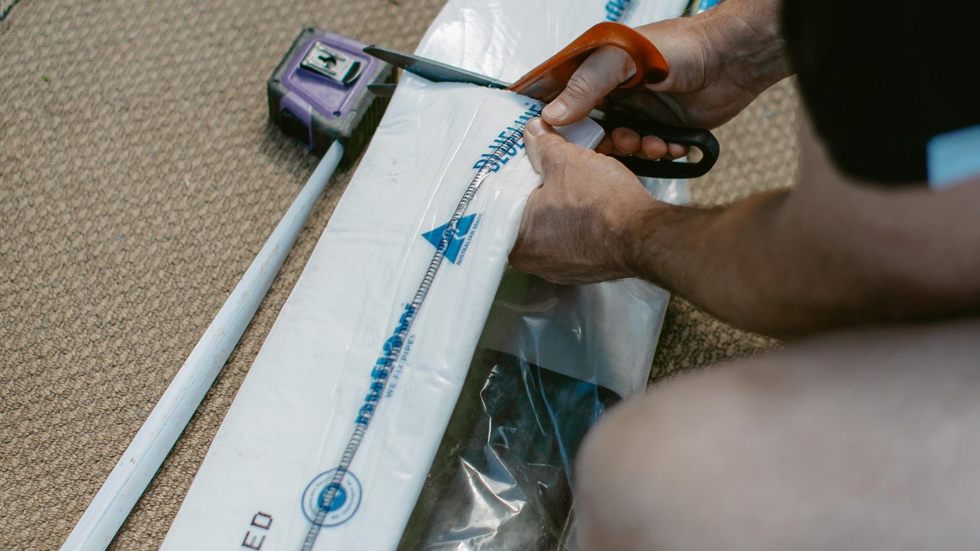 Measuring and cutting a relining liner to length