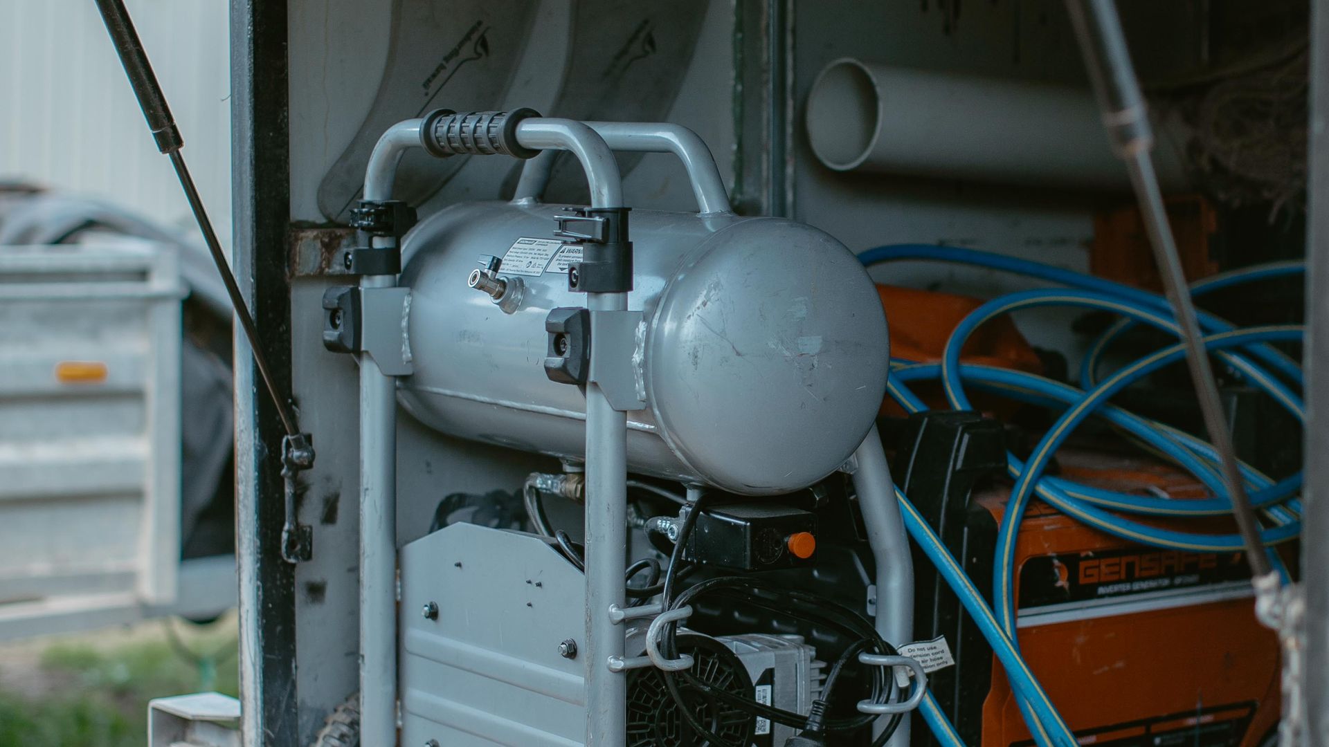 Adlington Plumbing equipment trailer set up on site